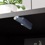 Meuble TV noir à motifs géométriques pour téléviseurs de 78" avec portes relevables et armoires de rangement